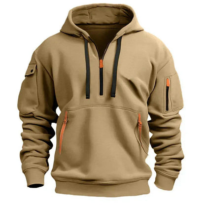 Tan hoodie with black and orange zippers on a white background